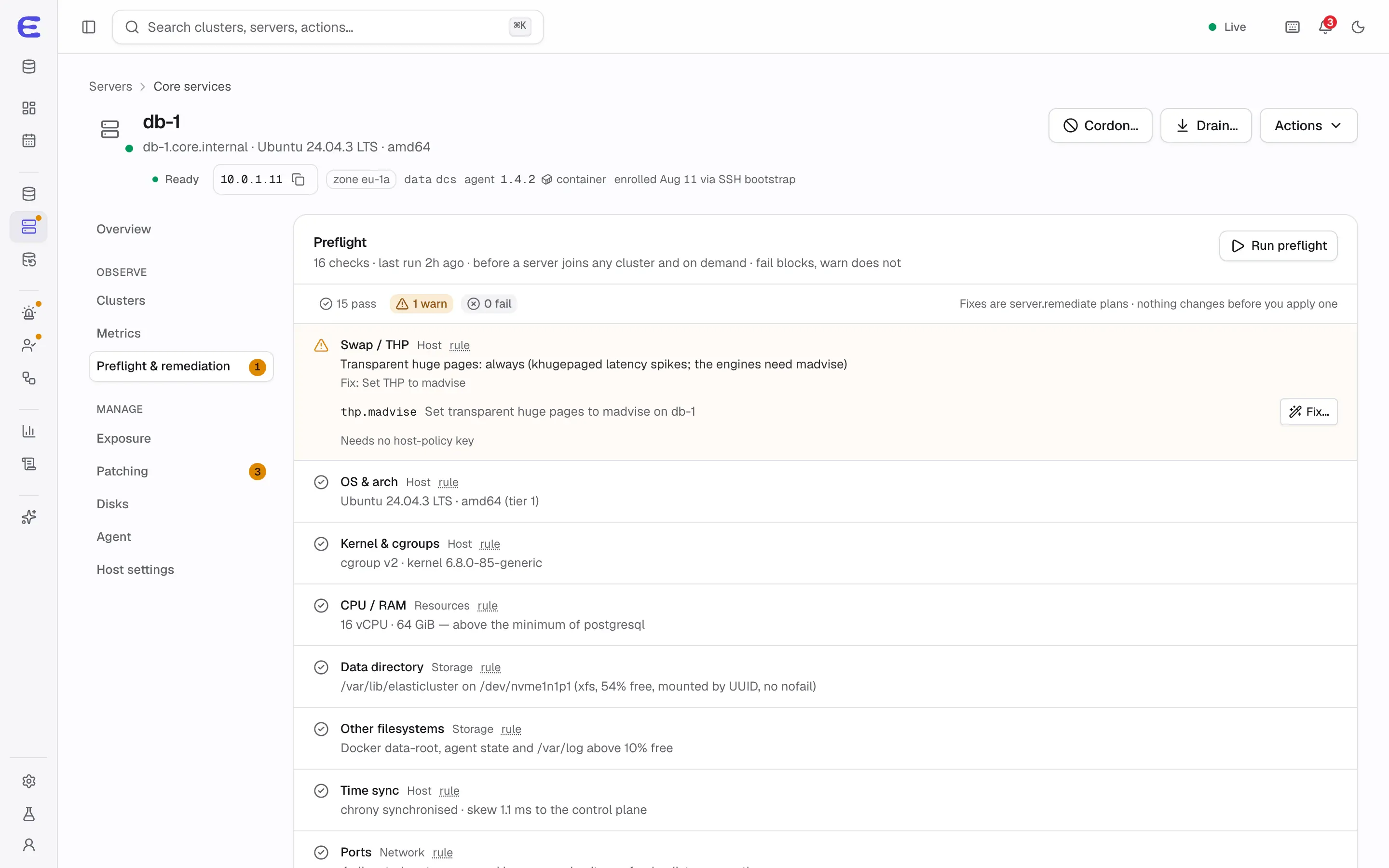 Preflight for db-1: a warning about transparent huge pages with a Fix button, and passed checks for the OS, kernel and cgroups, CPU and RAM, data directory, other filesystems and time sync.